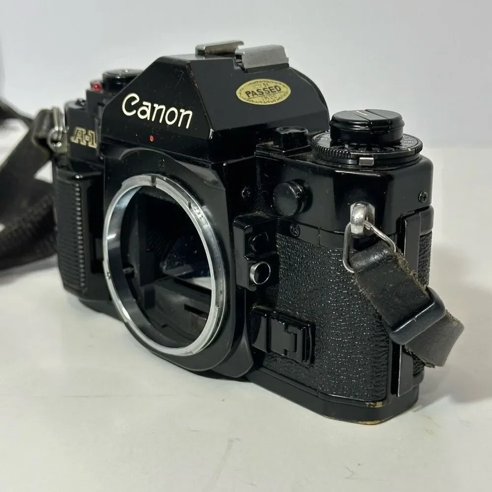 Vintage Canon A-1 Black 35 mm SLR with Strap/ Body Only